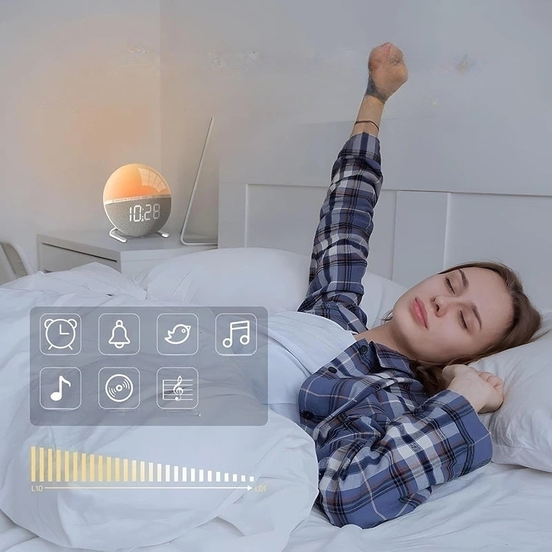  Réveil Simulateur d’Aube Design Tissu Gris sur table de nuit, femme se reveillant sous lumière colorée