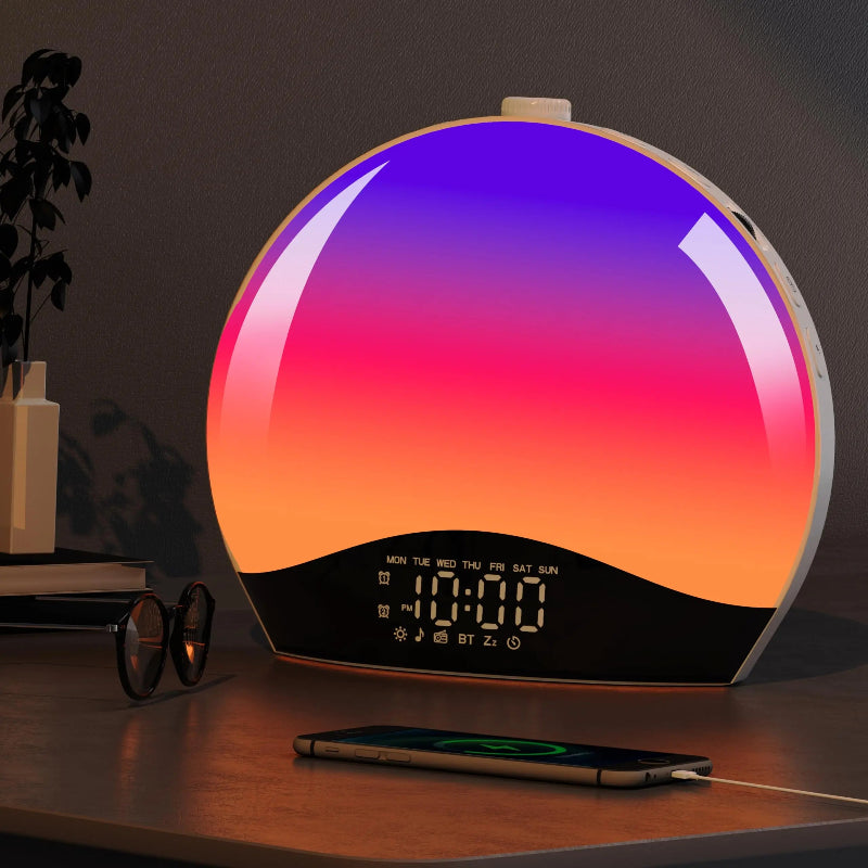 Réveil Simulateur d’Aube – Lever et Coucher de Soleil multicolore sur table de nuit, affichage LED clair et moderne.