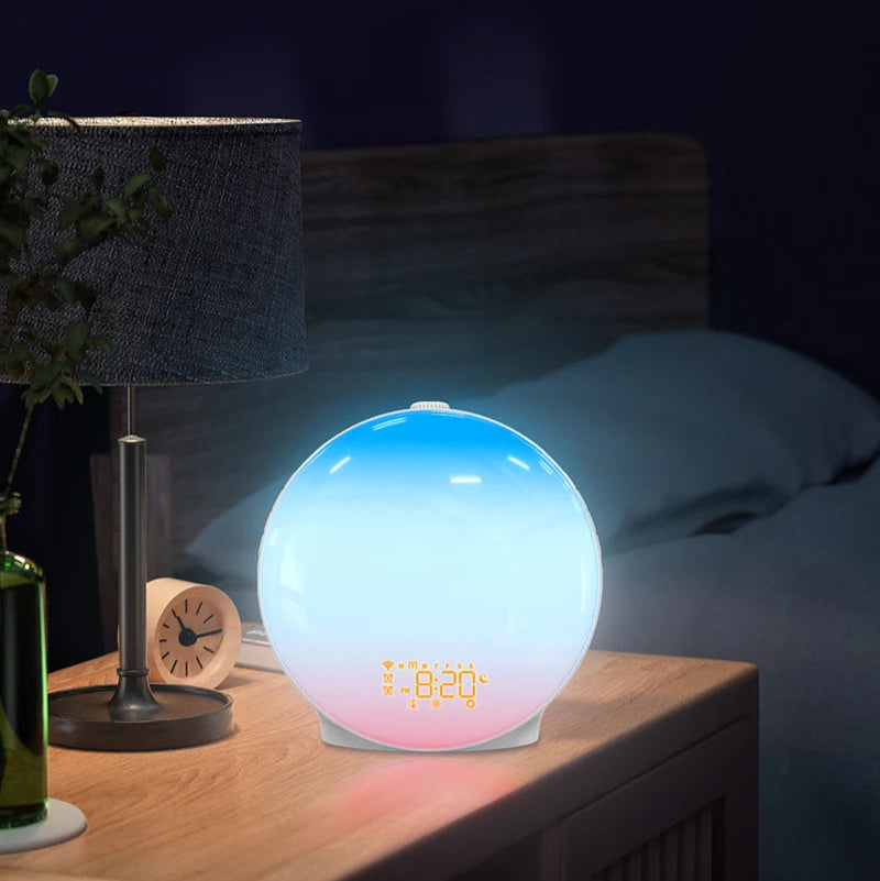 Réveil Simulateur d’Aube Lumineux bleu, reproduisant la lumière matinale pour un réveil doux.